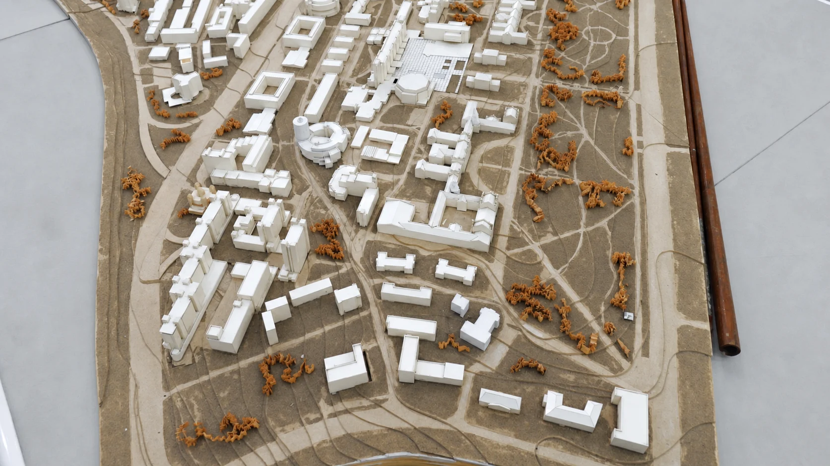 Architectural scale model of the KPI campus showing buildings, paths and green spaces